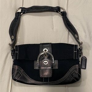 Small black coach purse.